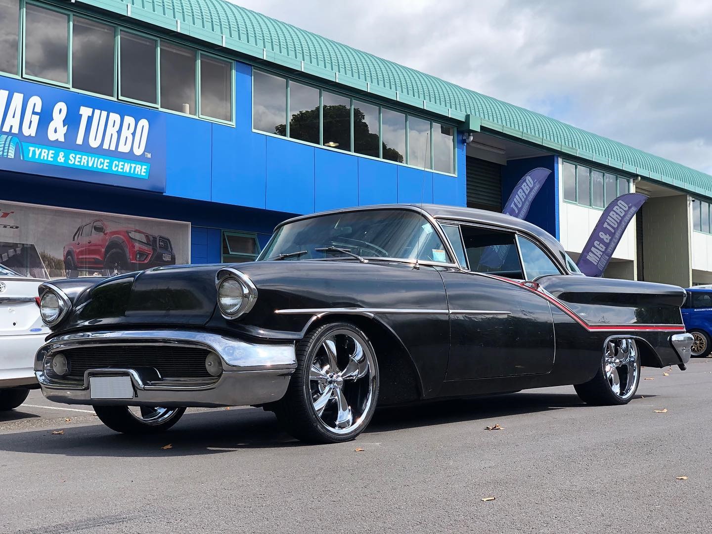Oldsmobile 98 (1957) on Staggered Ridler R695